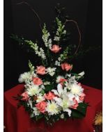 Funeral Flowers Around the Urn with Pink Roses