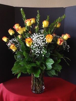 Two Dozen Circus Roses with Babies Breath
